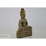 A SMALL STONE MODEL OF BUDDHA