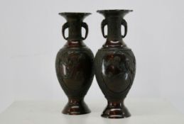 A PAIR OF ORIENTAL BRONZE VASES