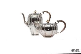 AN ENGLISH SILVER TEAPOT AND COFFEE POT