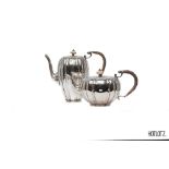 AN ENGLISH SILVER TEAPOT AND COFFEE POT