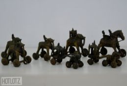 A LARGE GROUP OF ANTIQUE INDIAN PUSH ALONG TOY ELEPHANTS