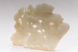 A CHINESE CARVED RETICULATED JADE GROUP