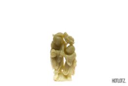 A CHINESE JADE FIGURAL GROUP