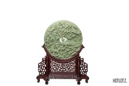 A CHINESE JADE BI DISC ON STAND