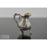 AN ANTIQUE FRENCH SILVER CREAM JUG