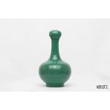 A CHINESE GREEN GLAZED GARLIC NECK BOTTLE VASE