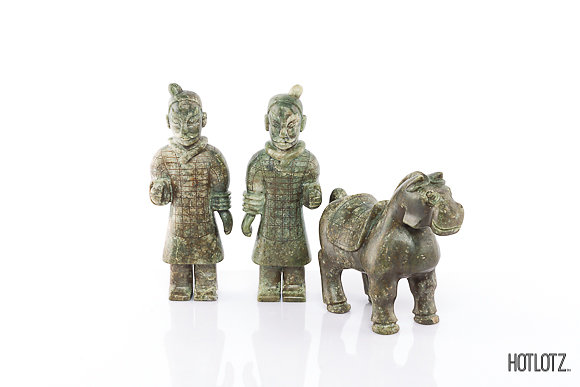 A GROUP OF CHINESE CARVINGS OF TWO SOLDIERS AND A HORSE