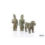A GROUP OF CHINESE CARVINGS OF TWO SOLDIERS AND A HORSE