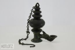 A CEYLONESE BRONZE CEREMONIAL HANGING OIL LAMP