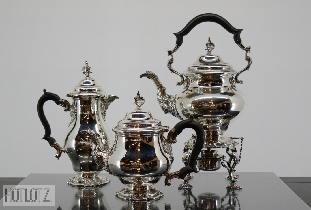 AN ENGLISH SILVER KETTLE, TEAPOT AND HOT WATER JUG