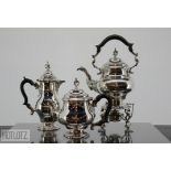 AN ENGLISH SILVER KETTLE, TEAPOT AND HOT WATER JUG