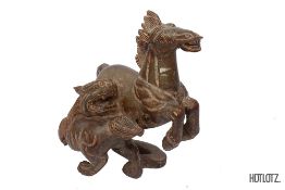 A CHINESE CARVING OF A FOO DOG AND HORSE