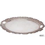 A VERY LARGE EDWARDIAN SILVER TWIN-HANDLED TRAY