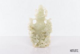 A CHINESE JADE DRAGON AND PHOENIX VASE AND COVER