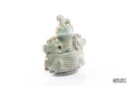 A CHINESE CARVED ARCHAISTIC VASE AND COVER