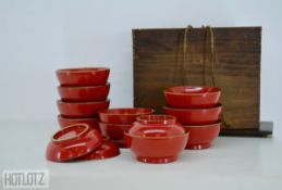A BOXED SET OF JAPANESE LACQUER BOWLS AND COVERS