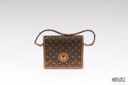 LOUIS VUITTON - A VINTAGE MONOGRAMED CANVAS SHOULDER BAG