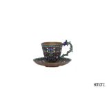 A RUSSIAN SILVER AND CLOISONNE ENAMEL COFFEE CUP AND SAUCER