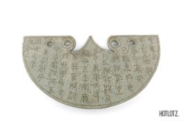 A LARGE CHINESE CARVED STONE SEMI-CIRCULAR PANEL