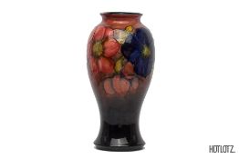 A MOORCROFT 'CLEMATIS' BALUSTER POTTERY VASE