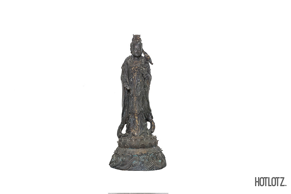 A LARGE CHINESE BRONZE STATUE OF GUANYIN