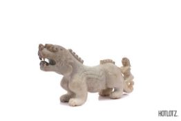 A CHINESE CARVED MYTHICAL BEAST