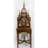 A reproduction Victorian design bird cage on stand in the form of a cathedral - 69in. high overall