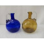 A 'Bristol' blue decanter (no stopper), a yellow ditto (no stopper) and a panelled decanter with cut