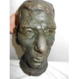 A bronze bust - Head and shoulders of a gentleman, incised initials MND 86 - 12in. high