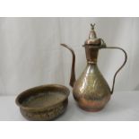 An Islamic Middle Eastern tinned copper ewer and five various bowls and dishes with Islamic designs