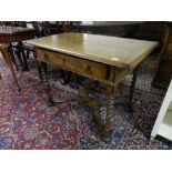 An antique oak sidetable in the William and Mary style with rectangular top, frieze drawer, on