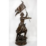 A 19th Century bronze study by Gaudez of Joan D'Arc holding aloft a flag, on circular base - 30in.