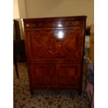 A 19th Century rosewood and crossbanded secretaire abatant fitted frieze drawer above hinged fall