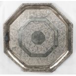 An Eastern silver tray of octagonal form with bands of flowers and leaves - 12in. wide