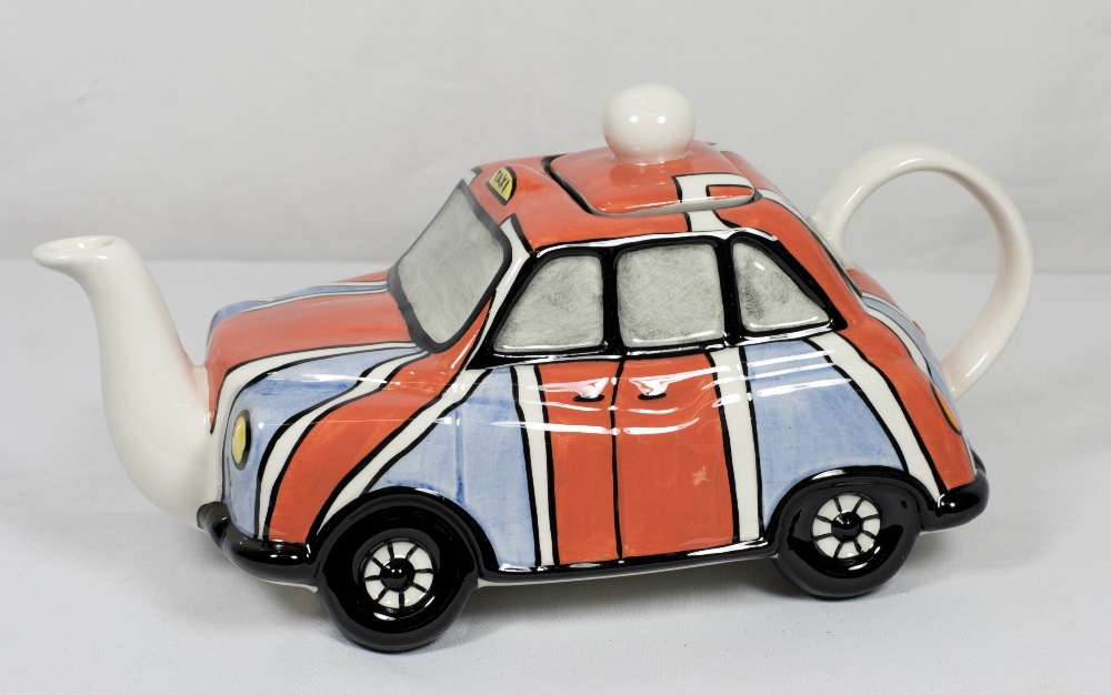 A Lorna Bailey limited edition teapot in the form of a taxi - no.12 of 50 - 5in. high