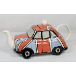 A Lorna Bailey limited edition teapot in the form of a taxi - no.12 of 50 - 5in. high