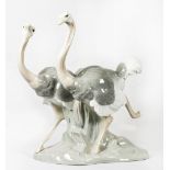 A Lladro group of two ostriches - 9 1/2in. high