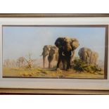 A coloured print after David Shepherd entitled The Ivory Is Theirs, framed and glazed - 14 1/2in.