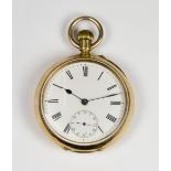 A gentleman's openface pocket watch with white enamel dial, seconds dial, in a plain 18ct. gold