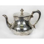 A Victorian silver teapot with all over engraved decoration, makers mark for George John Richards