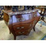 A reproduction French kingwood commode of bombe form with brown marble top, fitted three drawers,