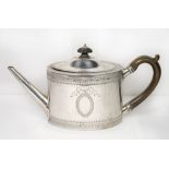 A George III oval silver teapot with engraved decoration, straight spout, makers mark for Robert