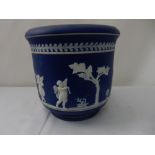 A pair of Wedgwood style jardinieres, deep blue jasper with white bas relief of cupids and trees -