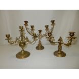 A pair of brass and alabaster five branch candelabra, a brass chatelaine, gilt metal twin branch