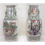 A pair of 19th Century Cantonese vases with flared necks, applied coiling dragons to the body,