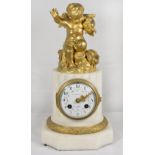 A 19th Century mantel clock retailed by L Caisso Et Cie, Paris with white enamel dial, striking