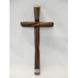 A Scottish pine cross mounted in Narwhal from a whaling ship - 18in. high