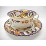 A large 18th Century Derby breakfast cup and saucer decorated in an Imari pattern in blue, gold