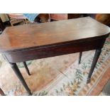 A 19th Century mahogany tea table with rectangular top, satinwood inlaid with floral paterae, canted