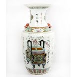 A Chinese vase with flared neck, Fo Dog mask ring handles, the body decorated vases of flowers and